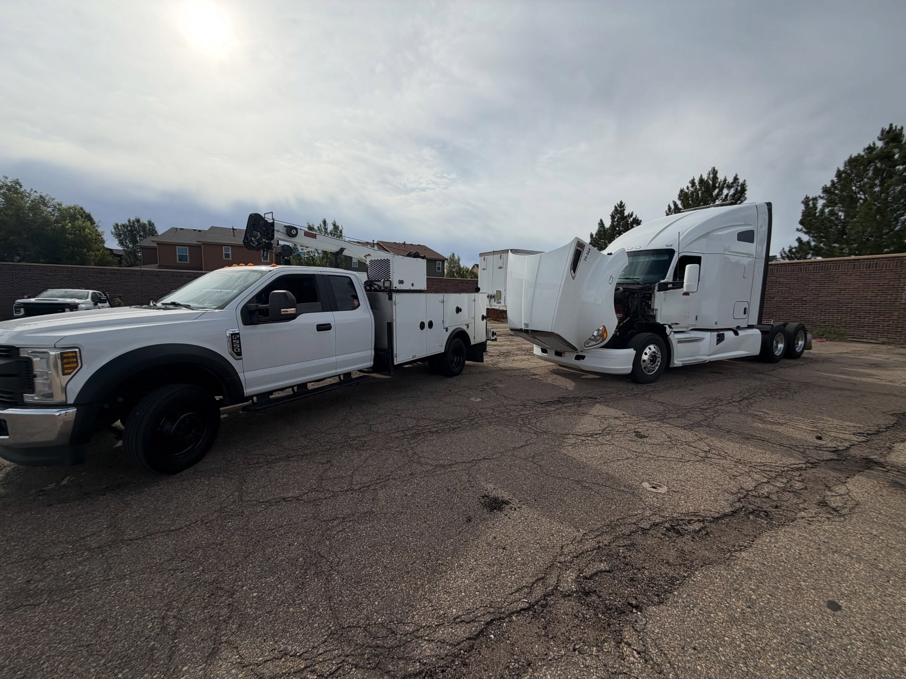 Summit Field Services — service truck alongside Kenworth semi